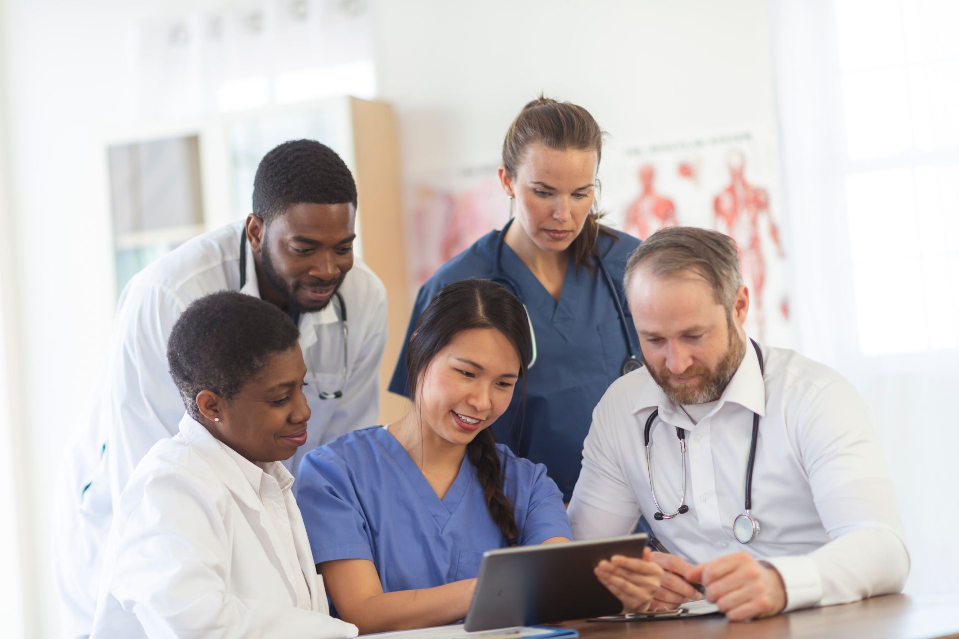 physician image doctor checking on a patient